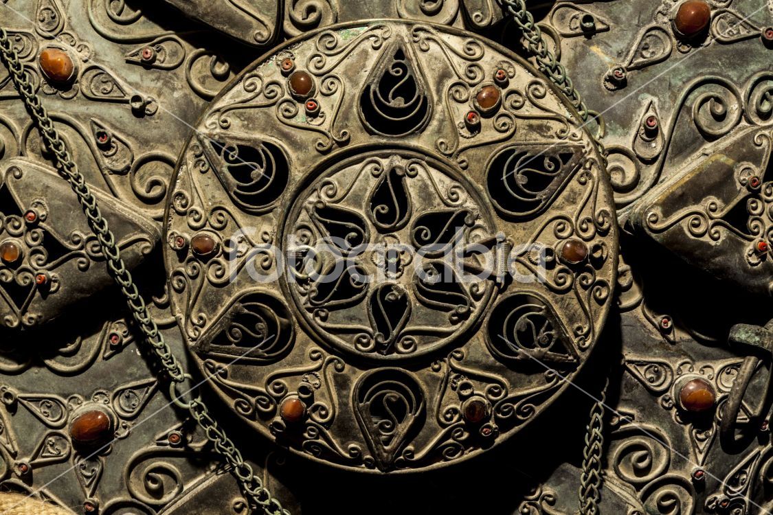 Metal sculpture with gems