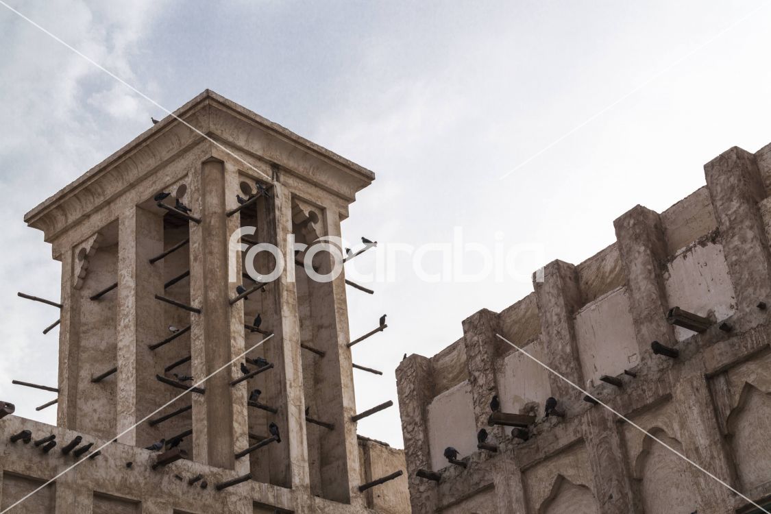 Windcatcher (malqaf) - Building with Pigeons in Souq Waqif