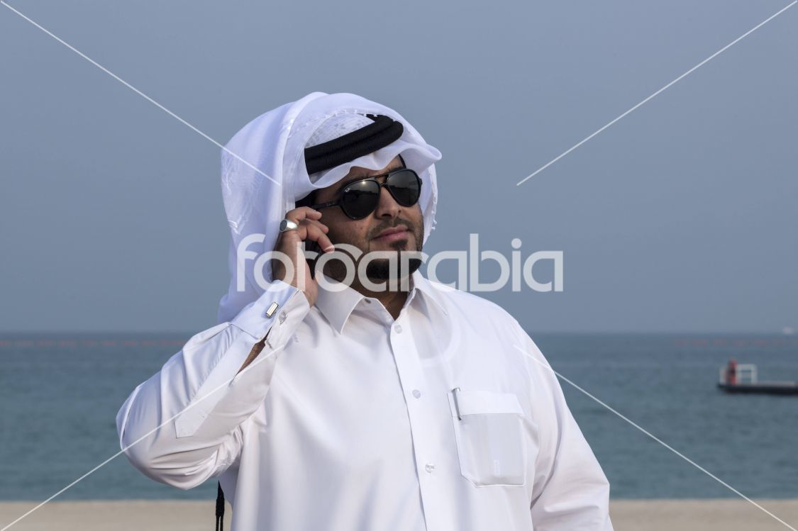Qatari using Cell Phone