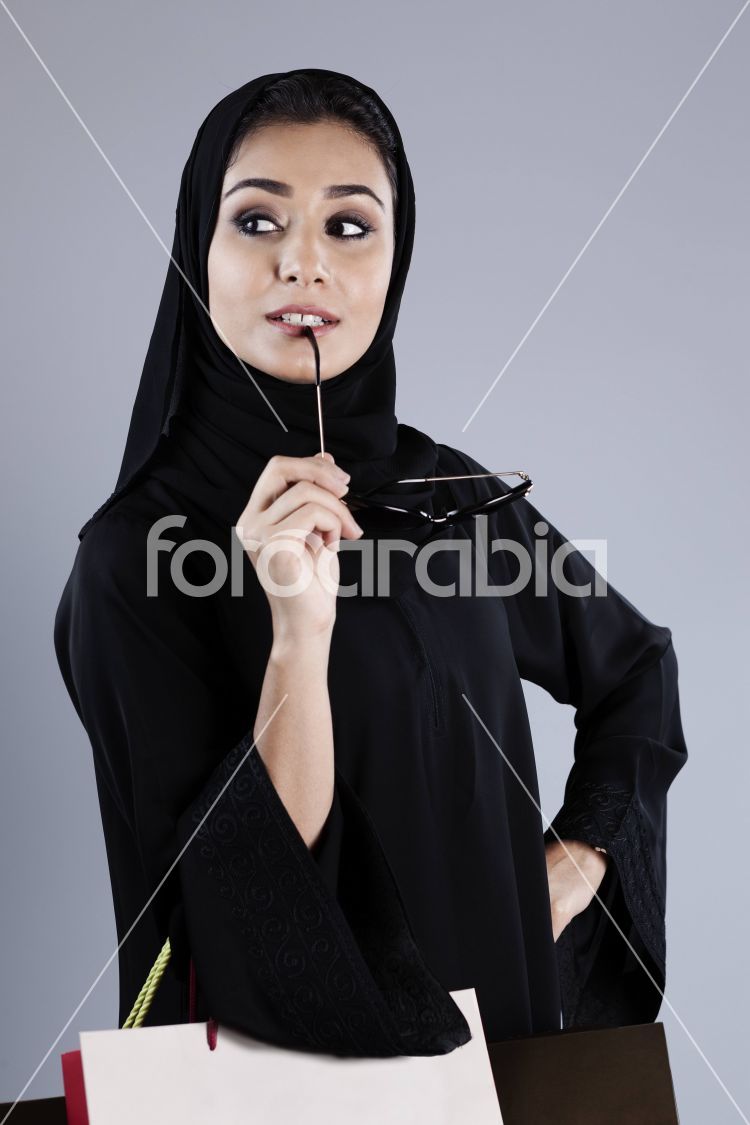 Arab woman with shopping bags
