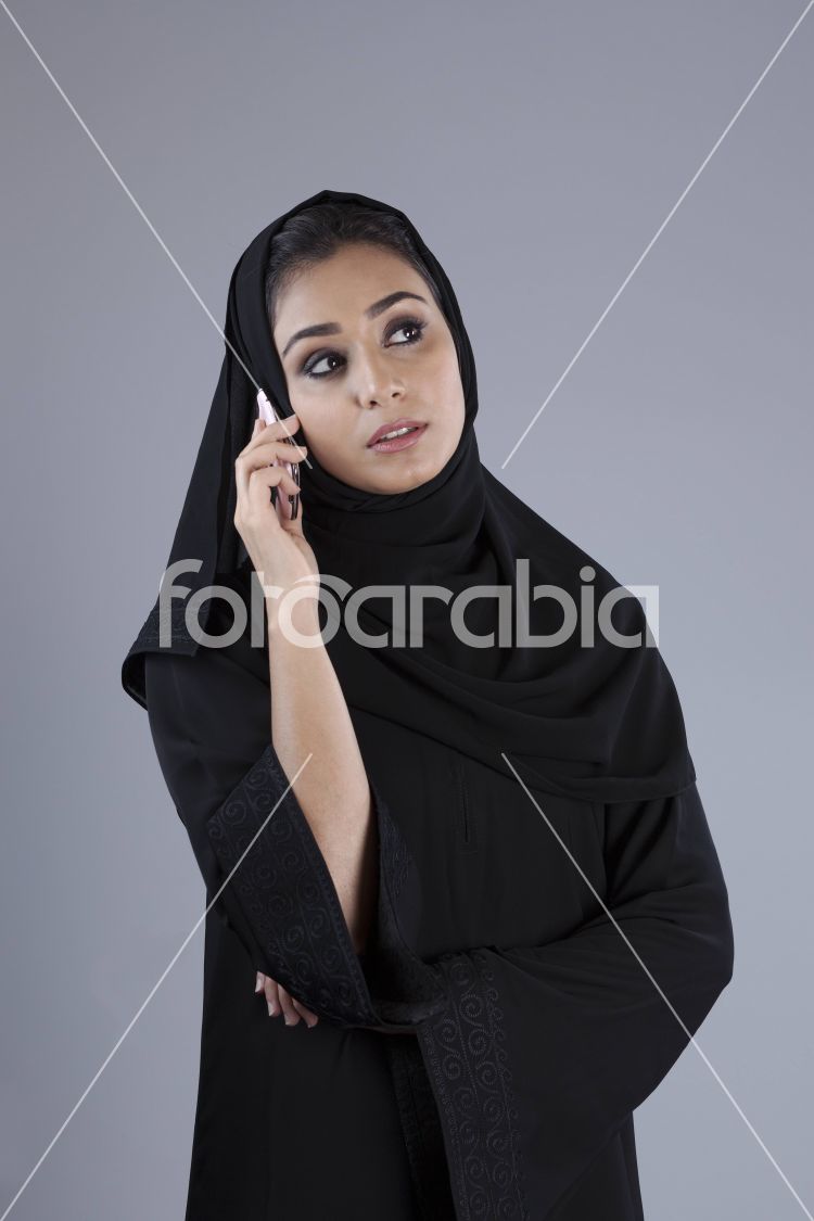 Arab woman using a mobile phone