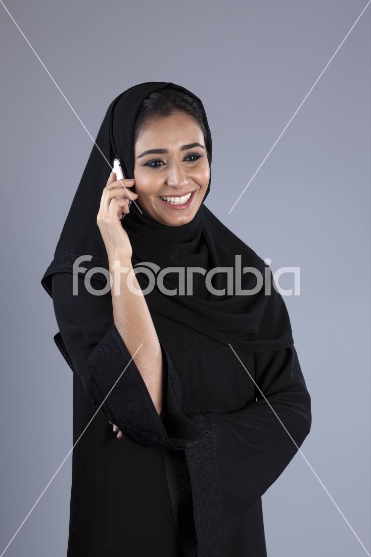 Arab woman using a mobile phone