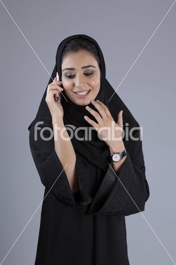 Arab woman using a mobile phone