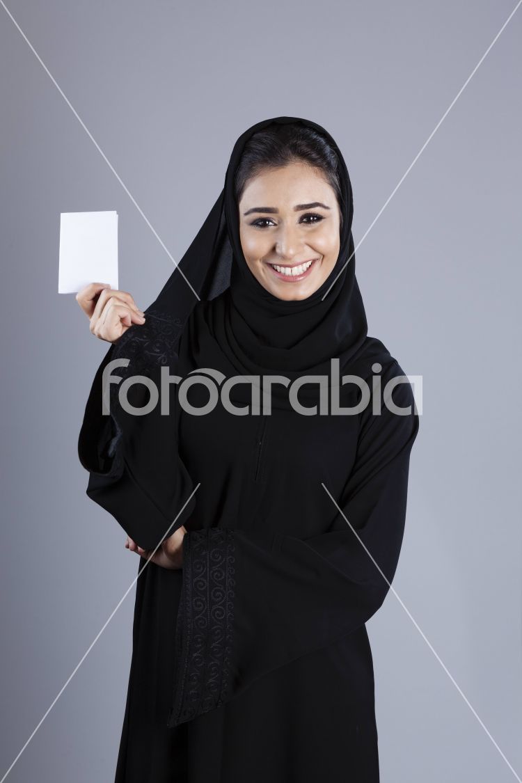 Arab businesswoman holding a plain white card