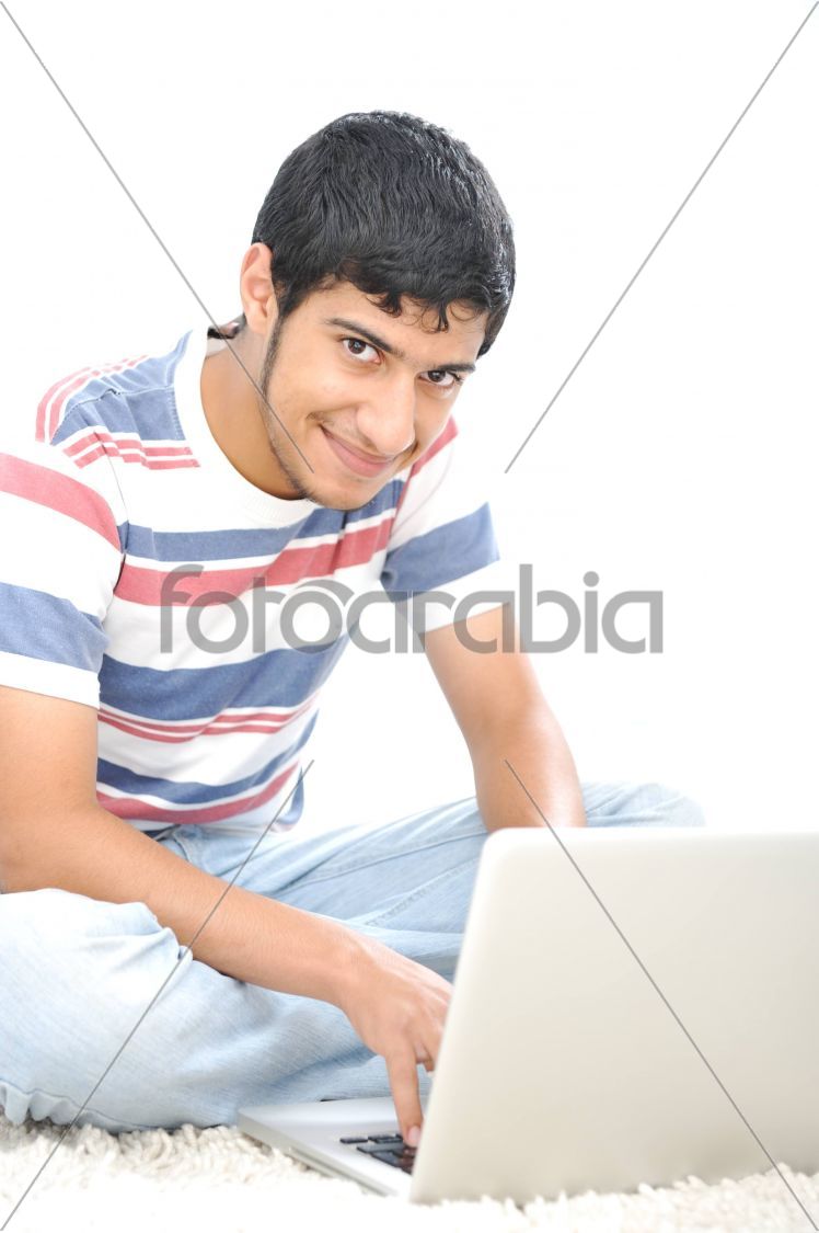 Cute teenage boy indoors