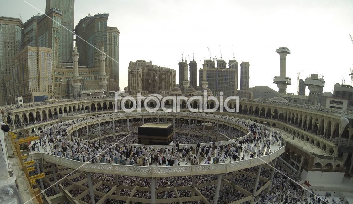 Muslim people praying at Kaaba in Mecca