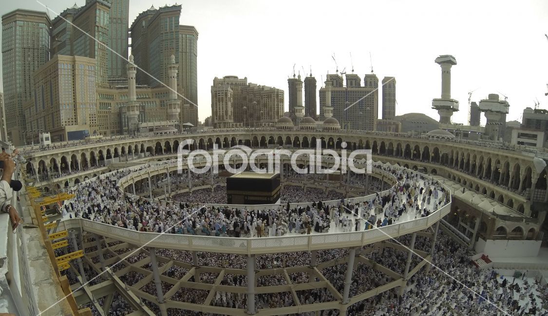 Muslim people praying at Kaaba in Mecca