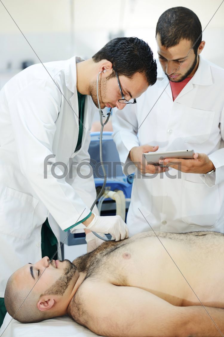 Active Arabic people posing in real hospital situation