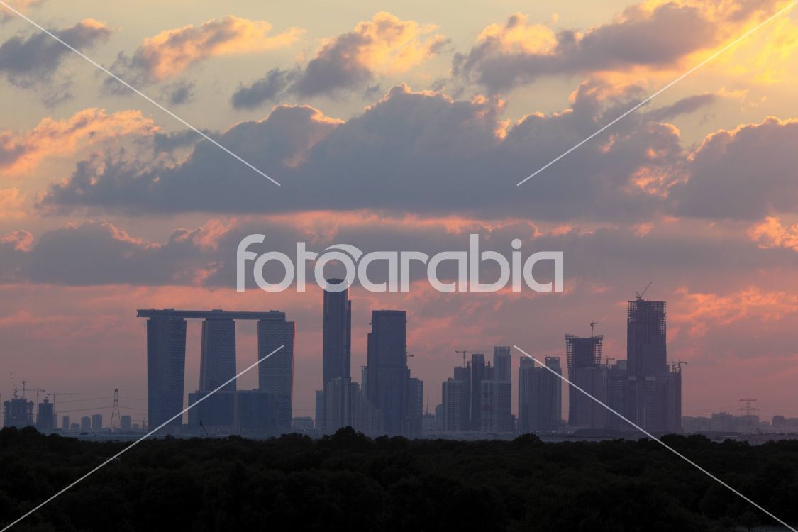 Abu Dhabi Skyline at sunset. United Arab Emirates