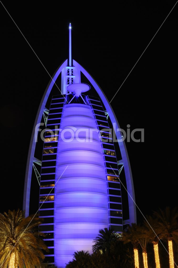 Blue illuminated hotel Burj Al Arab in Dubai