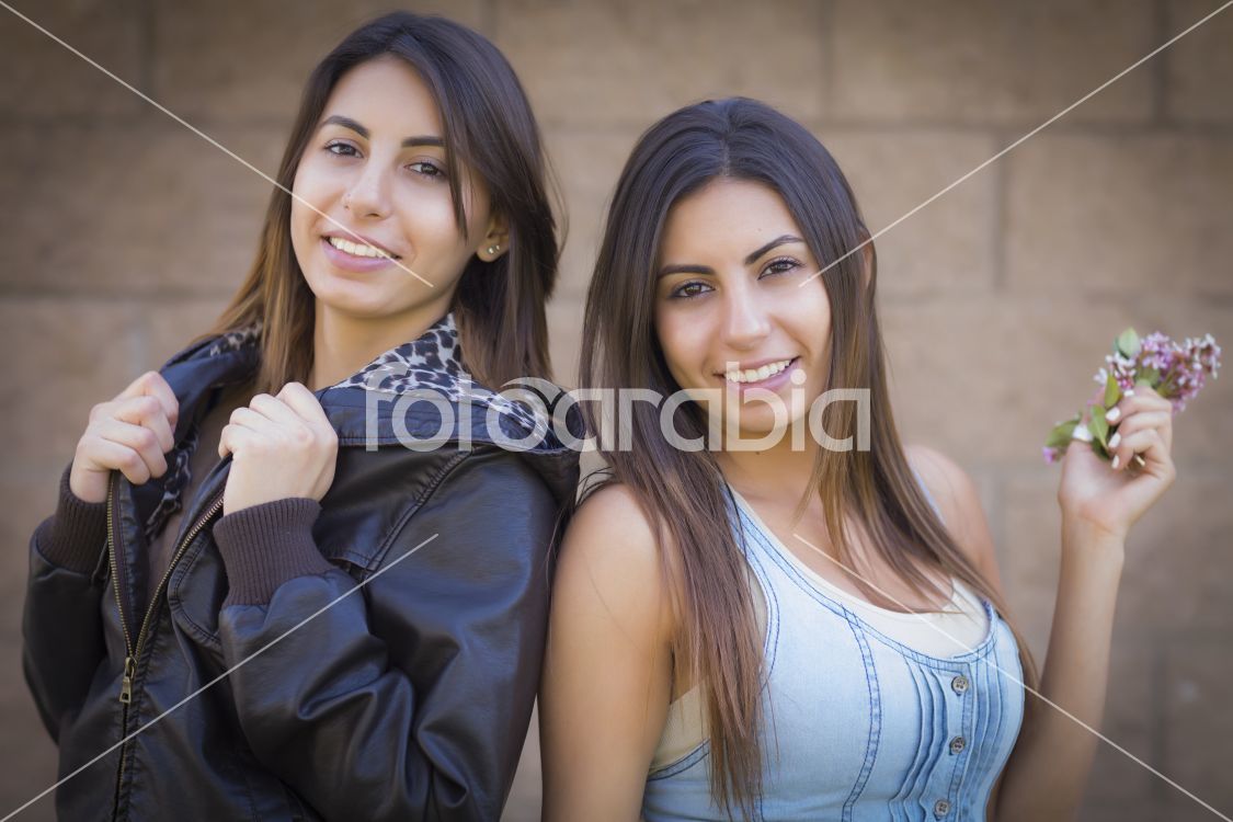 Two Mixed Race Twin Sisters Portrait