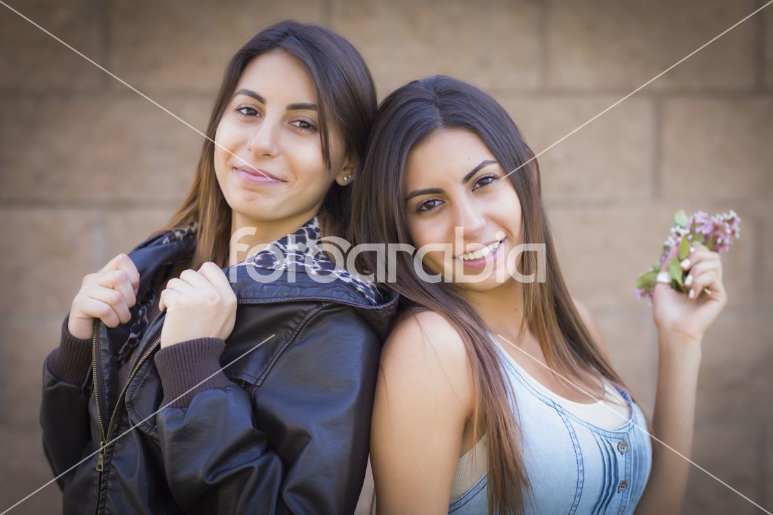 Two Mixed Race Twin Sisters Portrait
