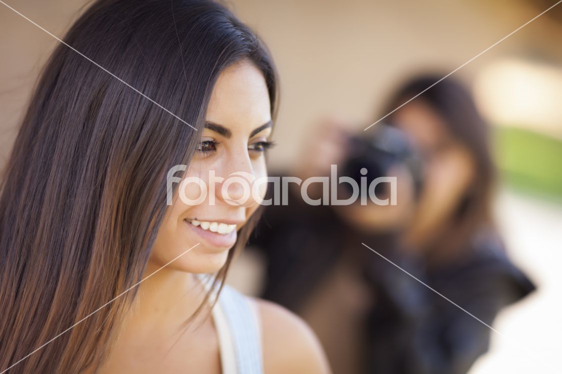 Young Adult Mixed Race Female Model Poses for Photographer
