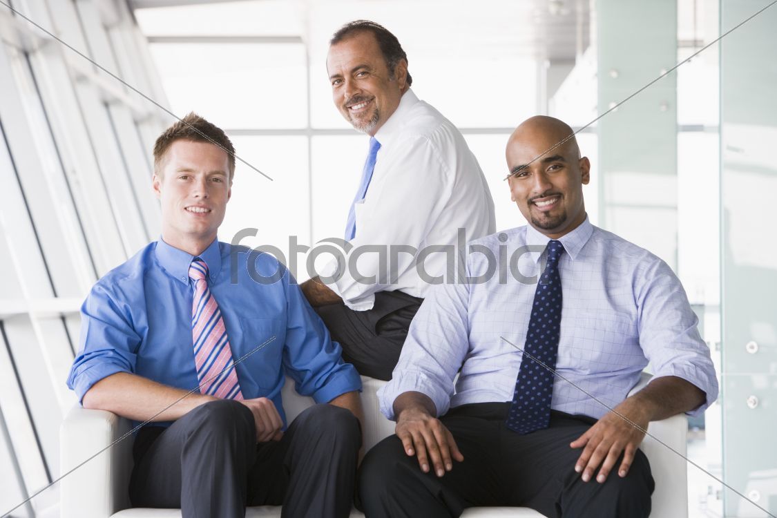 Group of businessmen sitting in lobby