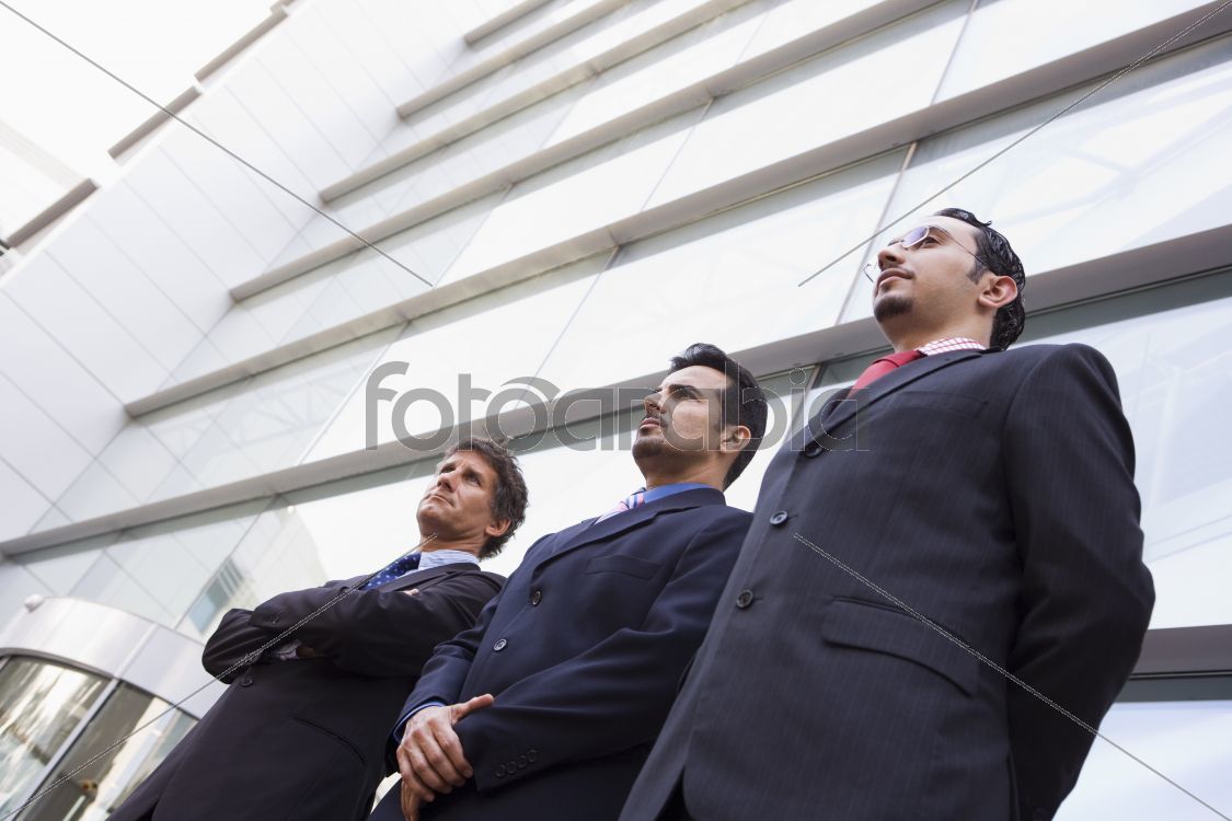 Group of businessmen outside office