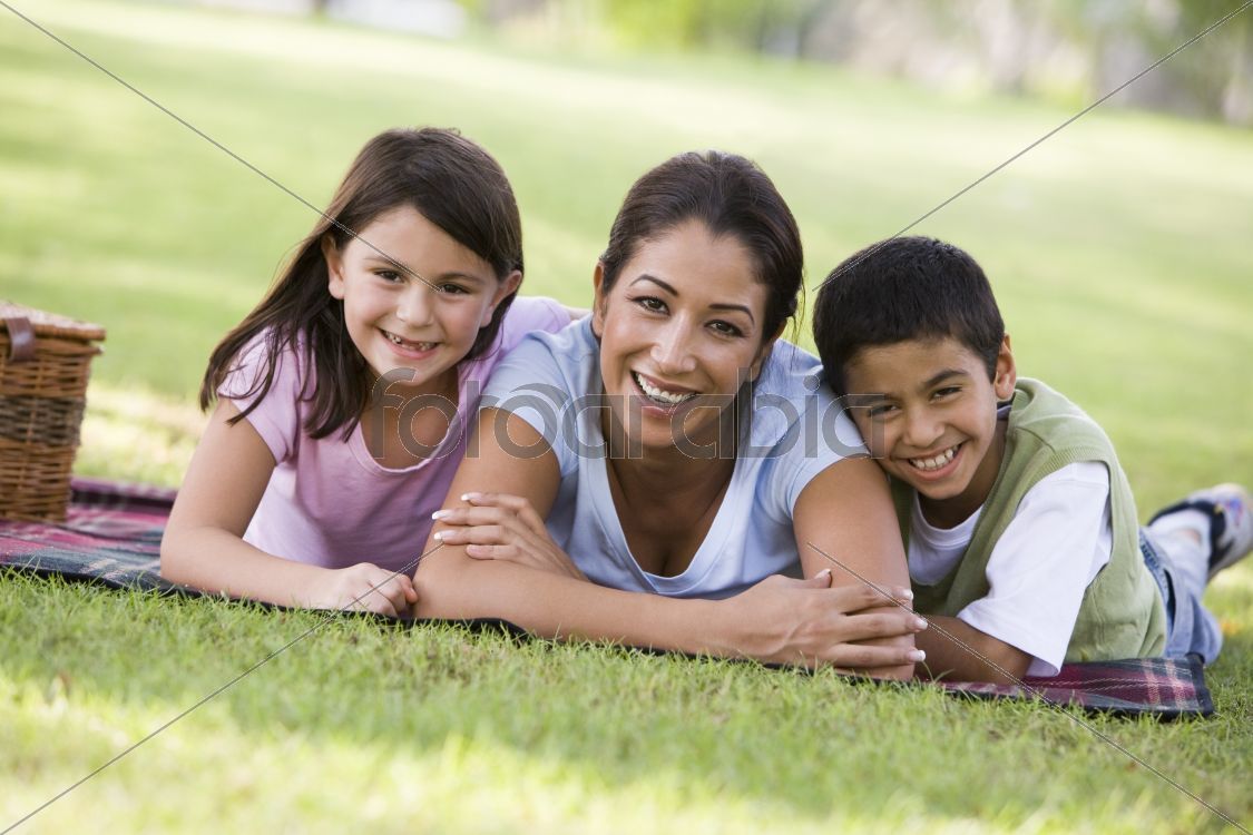 Mother and children having picnic