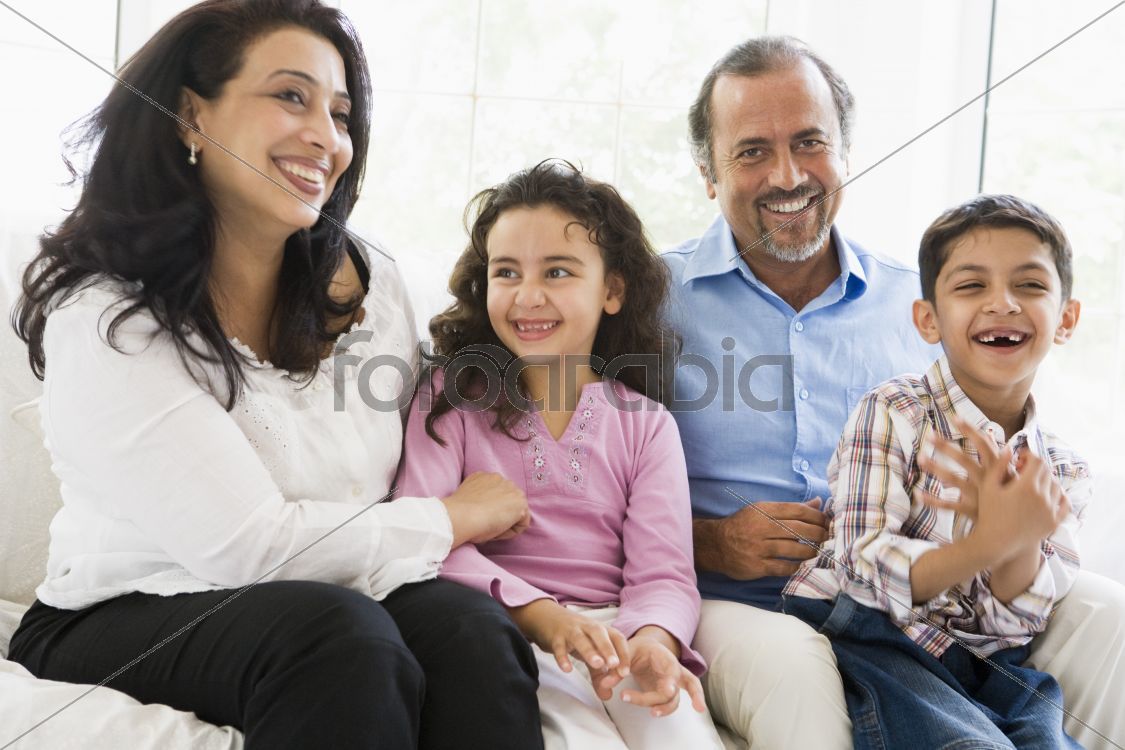 A Middle Eastern couple with their grandchildren