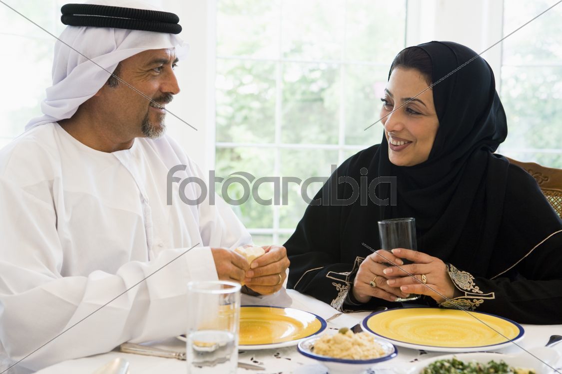 A Middle Eastern couple enjoying a meal