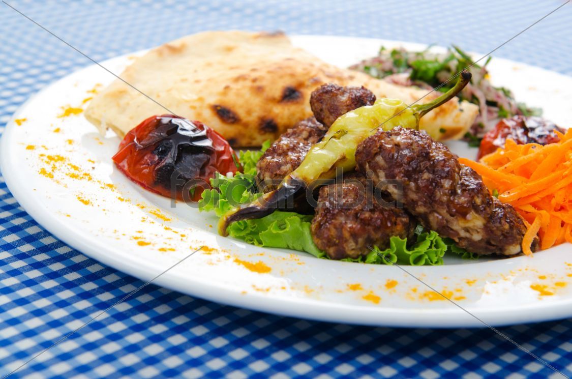 Meat cuisine - kebab served in plate