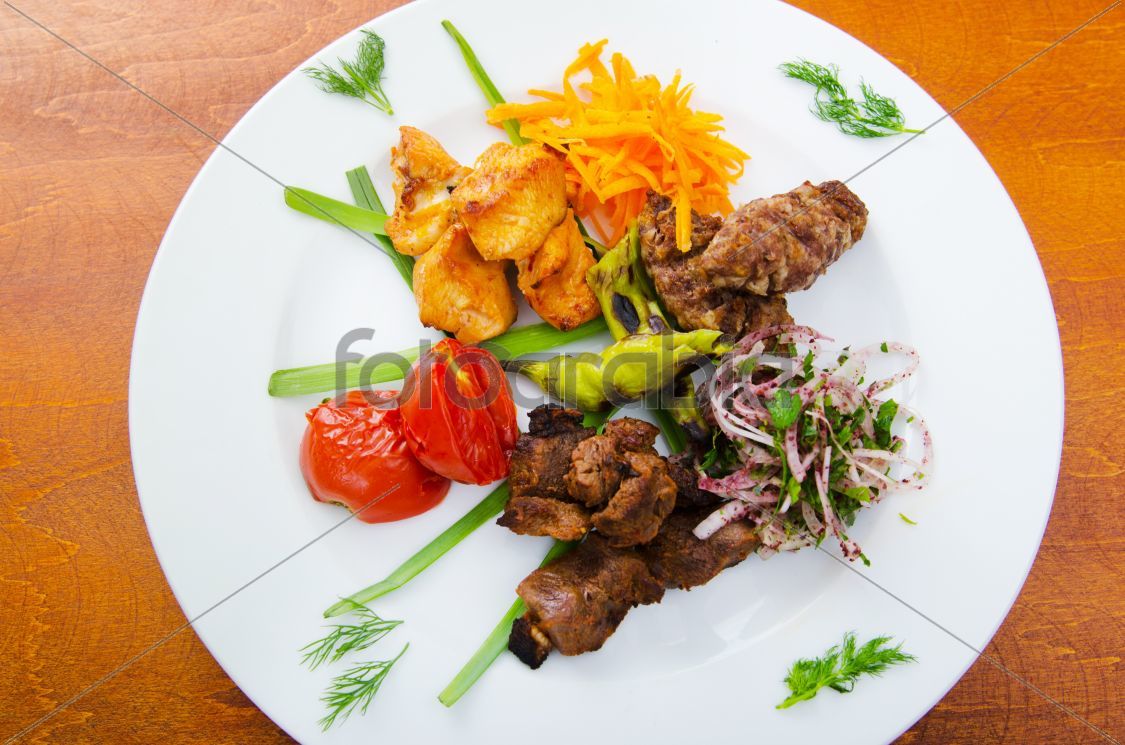 Plate with tasty lamp kebabs