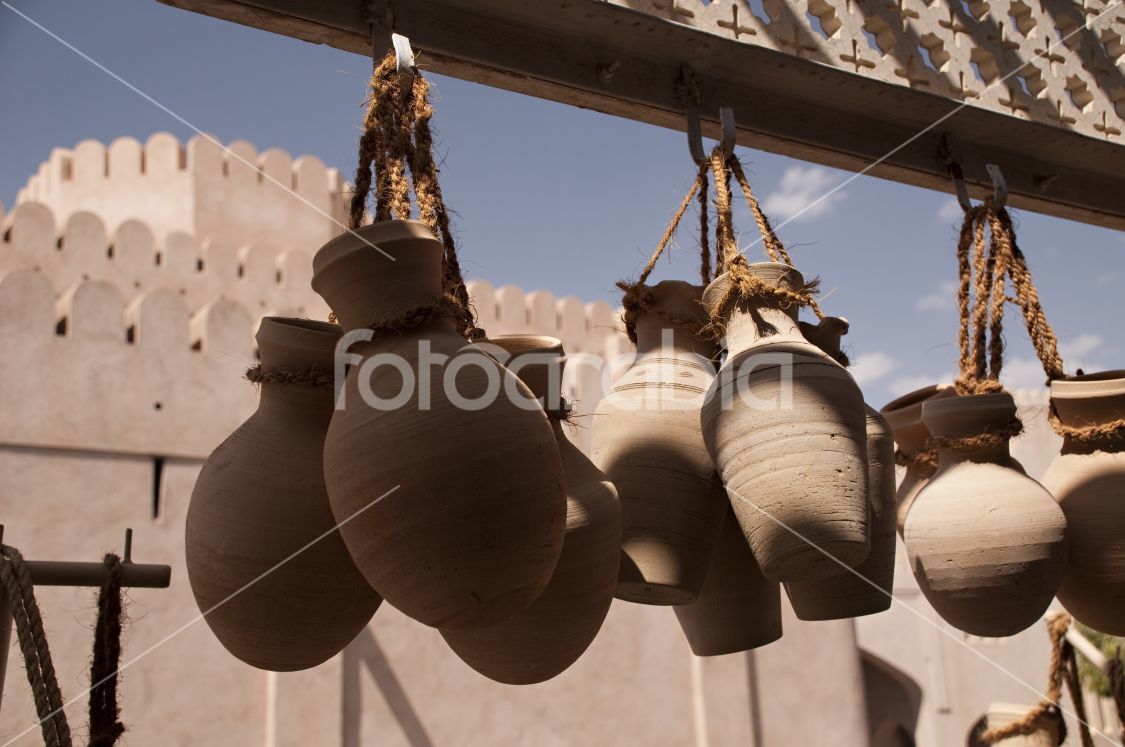 Clay jars in front of fort